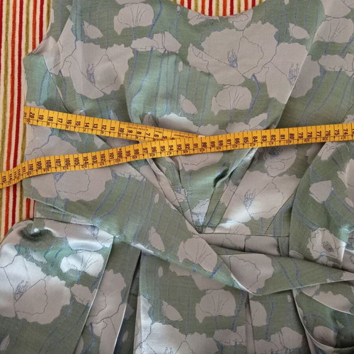Lola cocktail dress like new, midi green with silver patterns