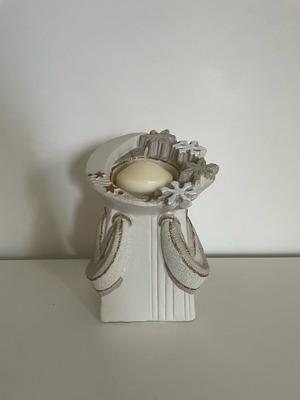 Decorative snowflake candle holder used, ceramic