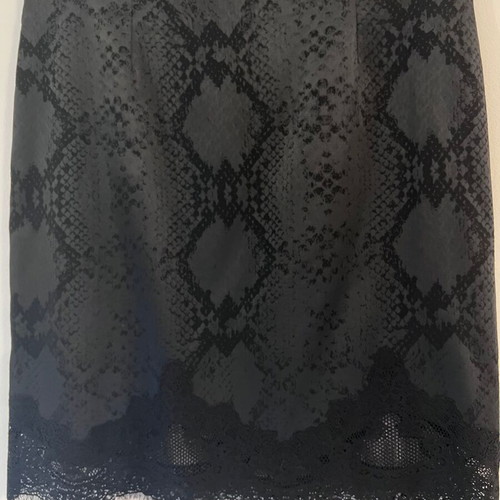 Lauren Vidal short skirt with snake skin pattern and lace trim
