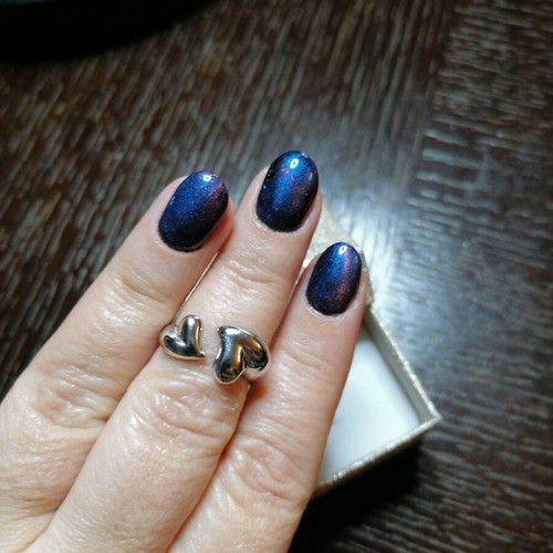 Steel ring with hearts new, silver color