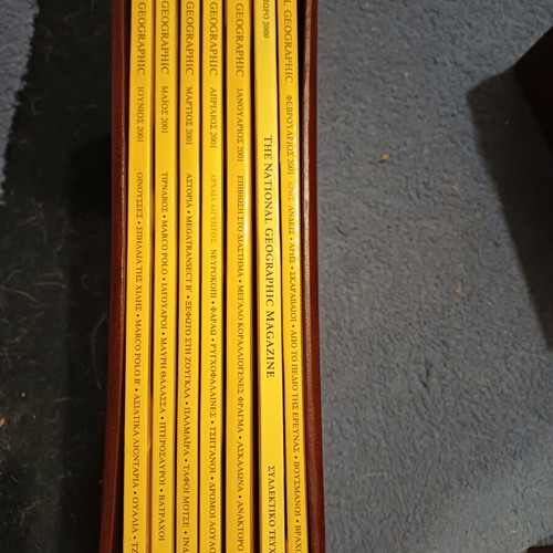 National Geographic magazines like new, 85 issues in custom leather cases