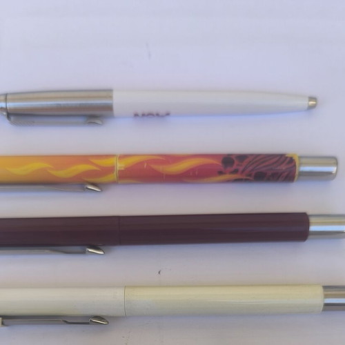 Parker set with Jotter pen and three Vector rollerball pens