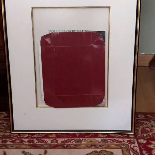 Photo frame with gold and black passepartout finish