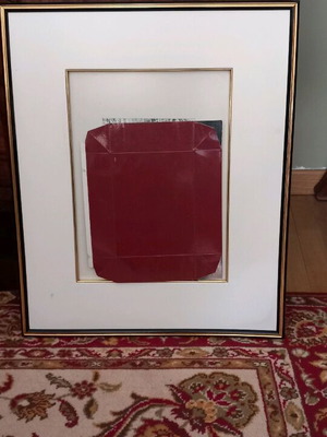 Photo frame with gold and black passepartout finish