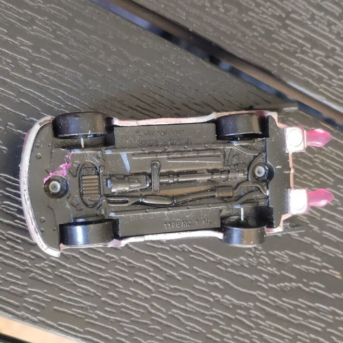 Disney Cars Boost 1:55 scale used with glued spoiler and bent wheels