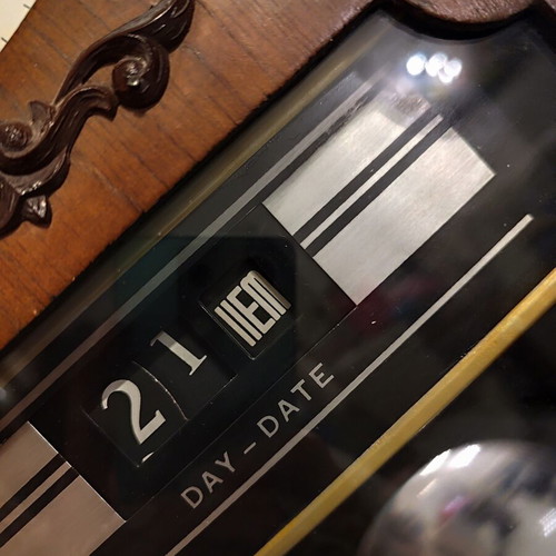 Frontier 31 Day mechanical wooden wall clock with pendulum and calendar like new
