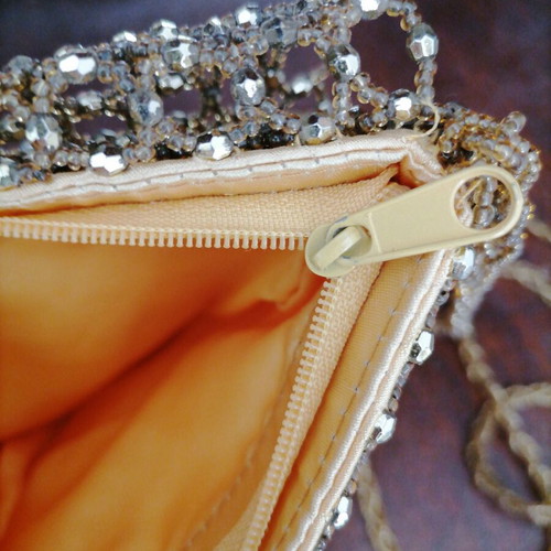 Evening bag used, gold-yellow shoulder with beaded chain strap