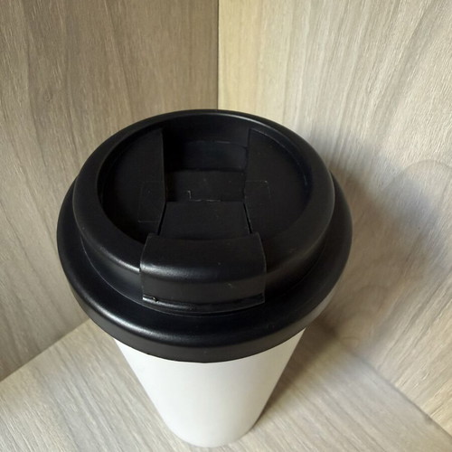 Reusable plastic coffee cup with screw lid