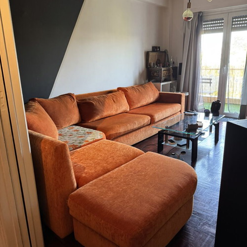 Modular sofa with reversible cushions