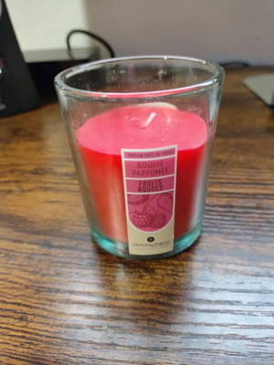 Scented candle in glass cup with red fruits aroma new