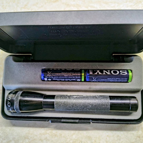 Mini Maglite flashlight used, metal with two batteries