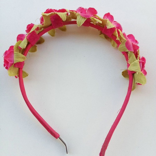 Children's tiara used with pink and green roses