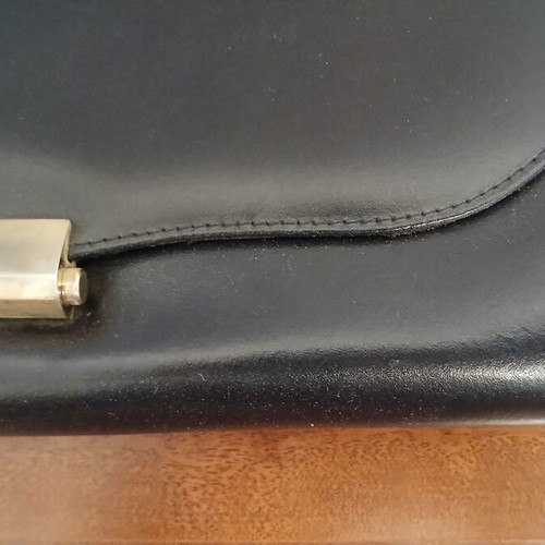 Envelope bag black genuine leather 14x28 cm used with plastic paint stain