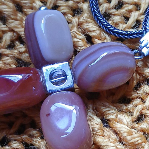 Silver necklace cross with carnelian stones used