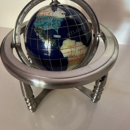 Decorative globe made of semi-precious stones like new