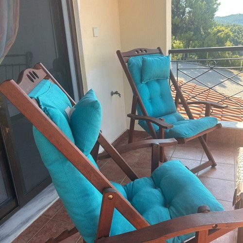 Outdoor chairs like new with blue fabric and reclining backrest