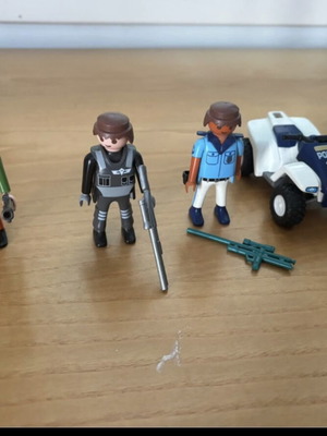 Playmobil police and cowboy figures