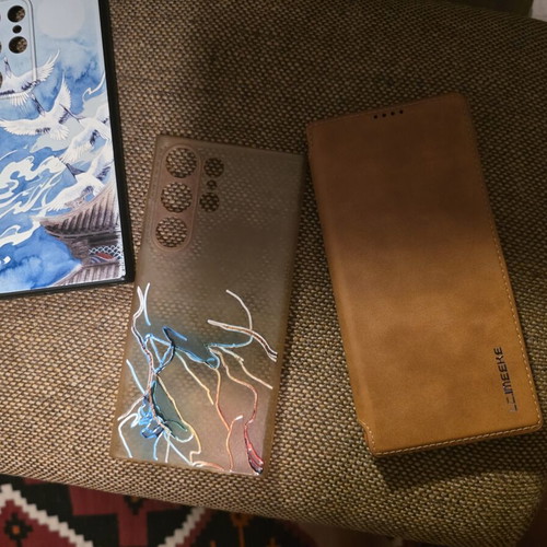 Samsung Galaxy S23 Ultra 256GB smartphone used, with 3 cases