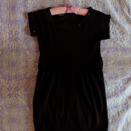 Dress with short sleeves used, black with subtle sequins