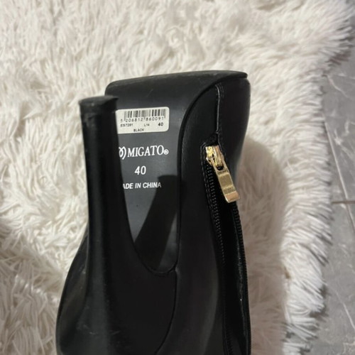 Migato black boots with 10 cm heel like new