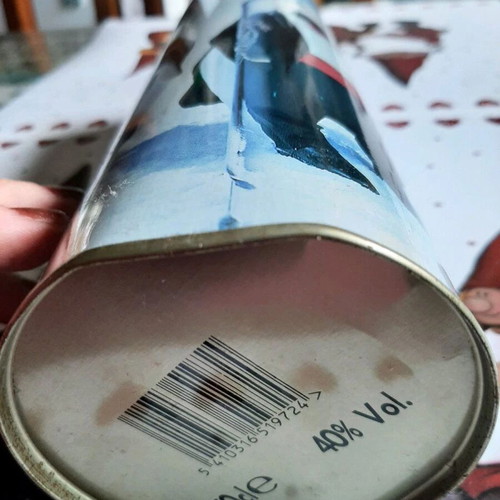 Smirnoff collectible tin and Ursus Rotter red bottle used
