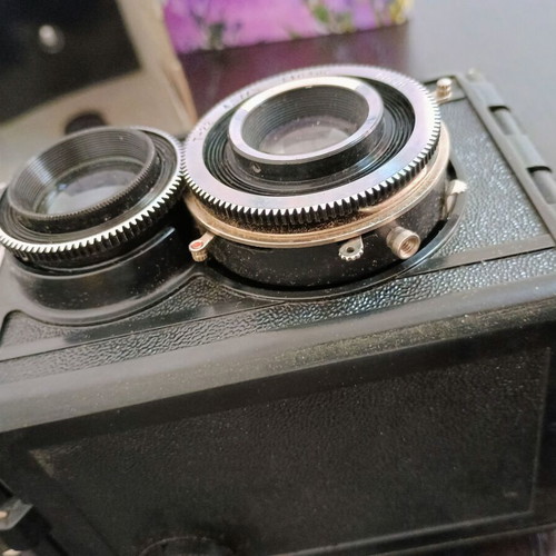 Lubitel 2 camera used with black leather case