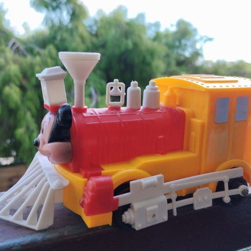 Mickey train vintage with movement and whistle, includes battery
