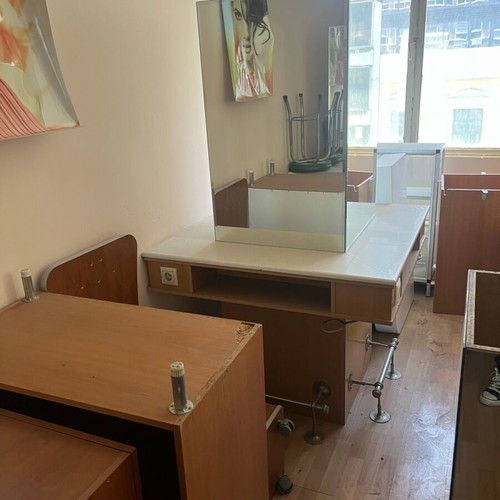 Hair salon items used, mirrors, furniture and chairs