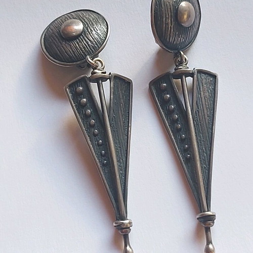 Silver earrings used, large with clips, black and silver