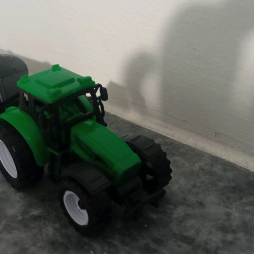 Toy tractor used, plastic, like new in box