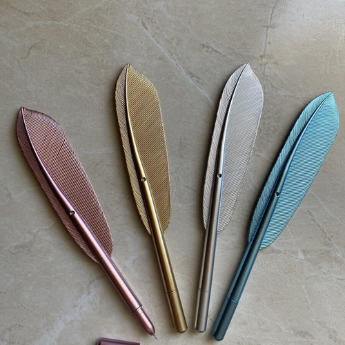 Feather-shaped pens new, set of 4