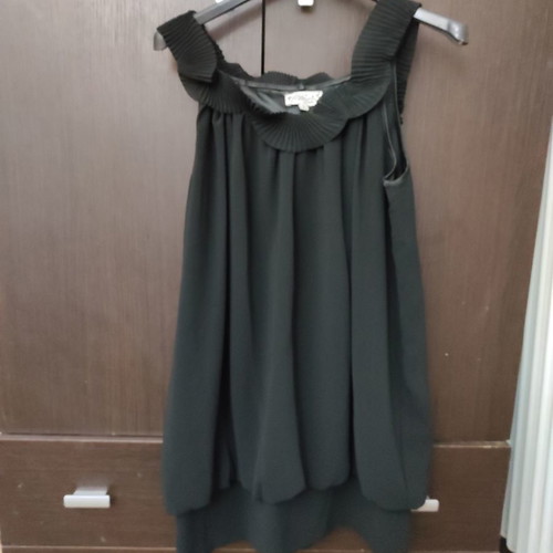 Black sleeveless wide blouse used, size medium-large