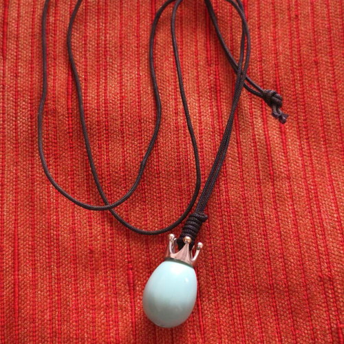 Handmade necklace with crown pendant and teardrop stone, used