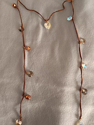 Handmade necklace like new with brown leather cord