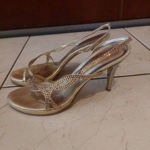 Gold sandals used, size 38