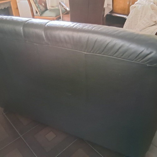 Black two-seater leather sofa used, soft genuine leather