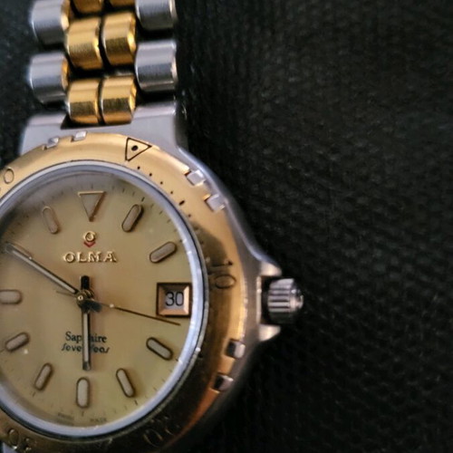 Olma Sapphire Seven Seas wristwatch like new, Swiss made