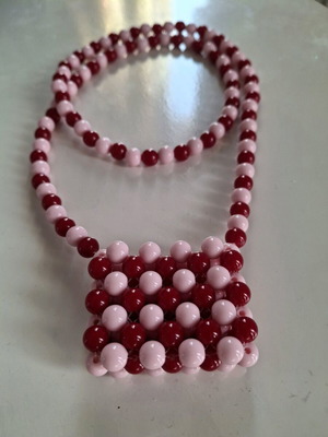 Handmade necklace pouch with pink and red beads made to order