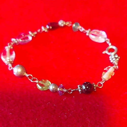 Children's bracelet like new with beads and metal elements
