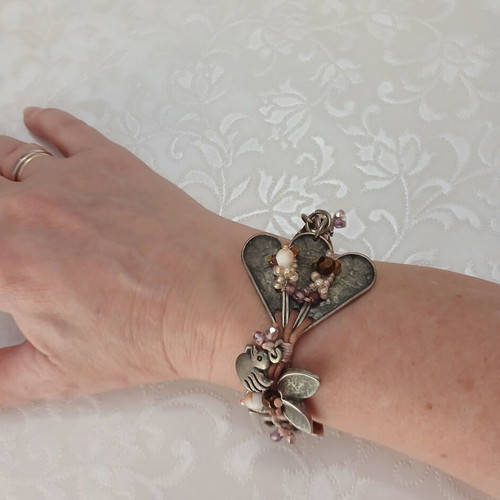 Russa handmade bracelet like new with floral and duck design