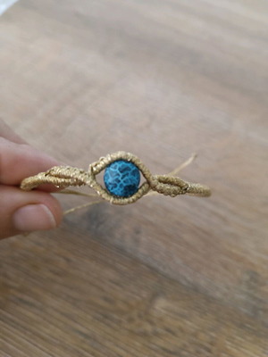 Macrame bracelet new with blue stone and gold details