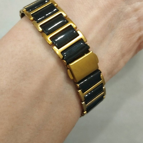 Women's wristwatch used, black and gold, 22cm bracelet