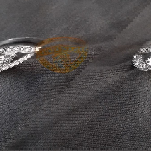 Пръстен сребрист цвят със циркони като нов