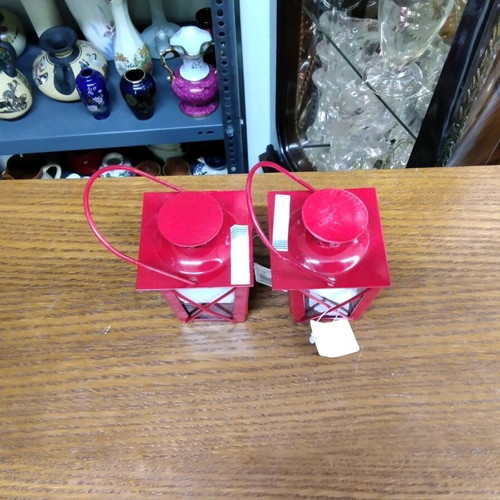 Set of red tabletop lanterns with handle, like new, 2 pieces