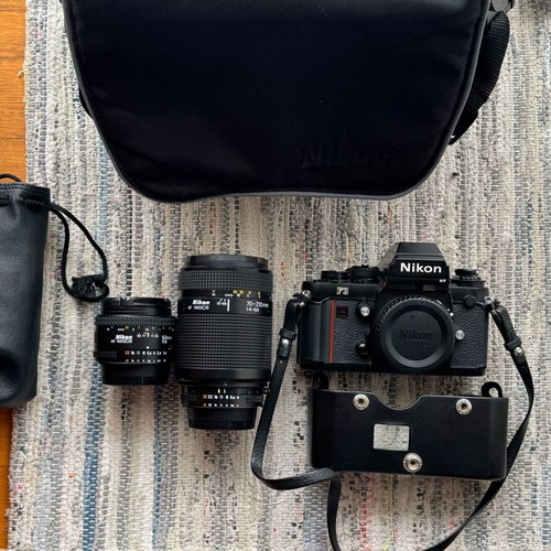 Nikon F3 HP camera like new with 2 lenses and leather strap