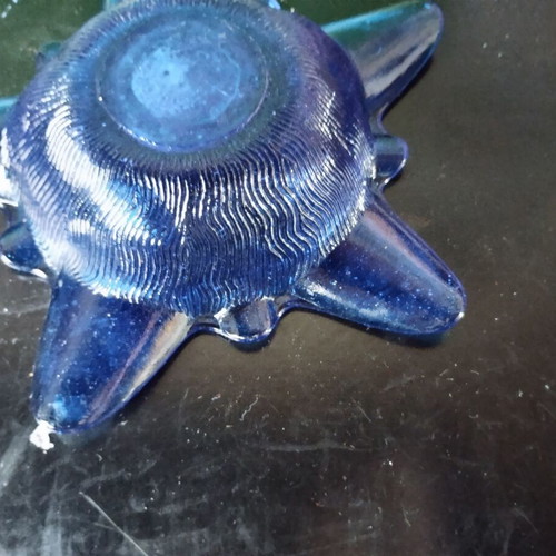 Star-shaped glass ashtray used, decorative