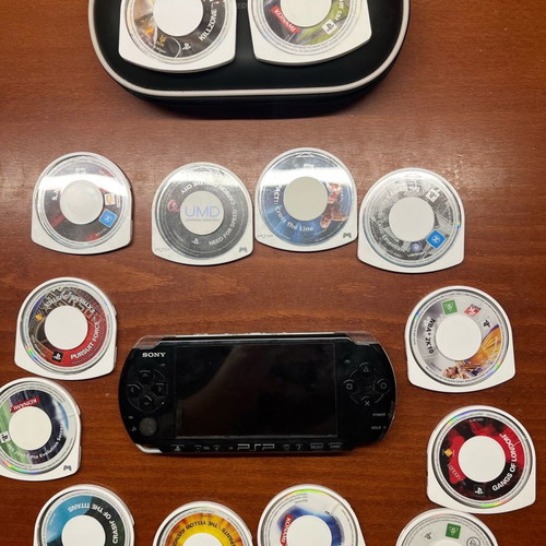 Sony PSP used for parts with 10 games and carrying case