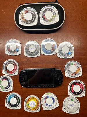 Sony PlayStation Portable (PSP) used with 10 games and carrying case