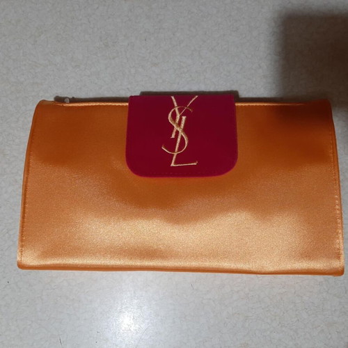 Yves Saint Laurent clutch bag new, vintage, orange