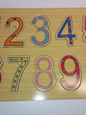 Wooden puzzle with numbers used